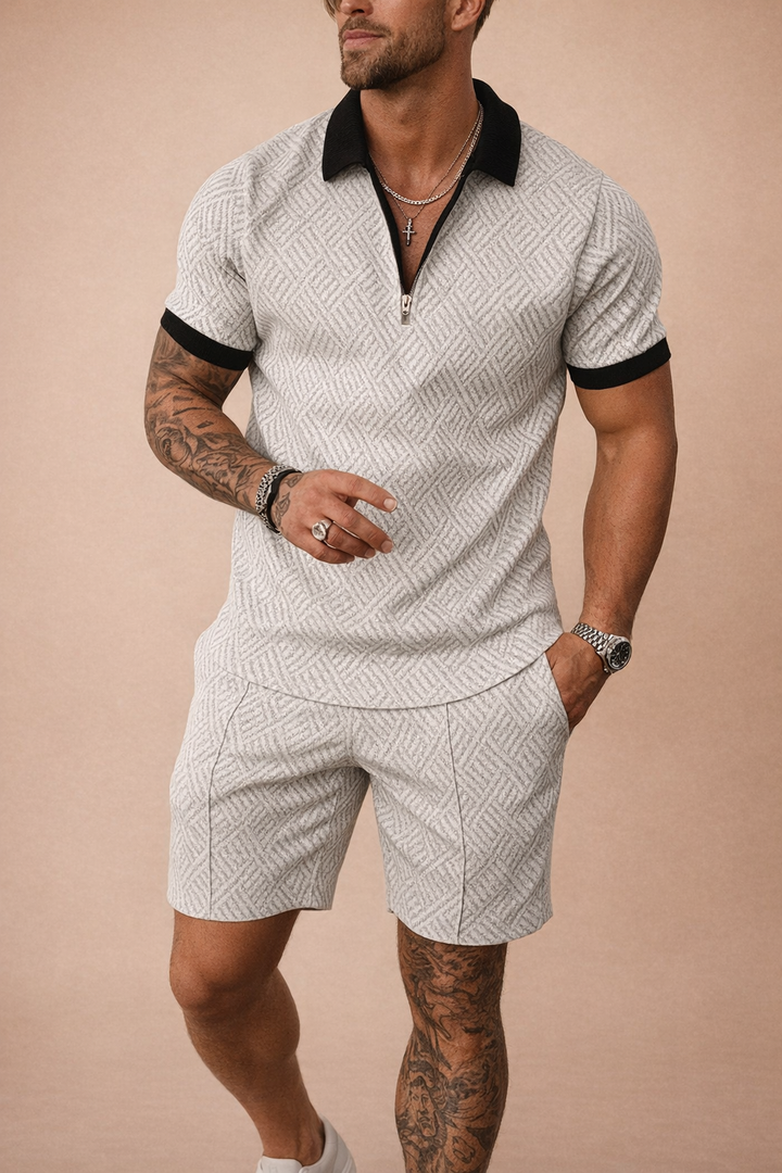 Textured polo shirt for men, paired with tailored shorts for a complete summer look.