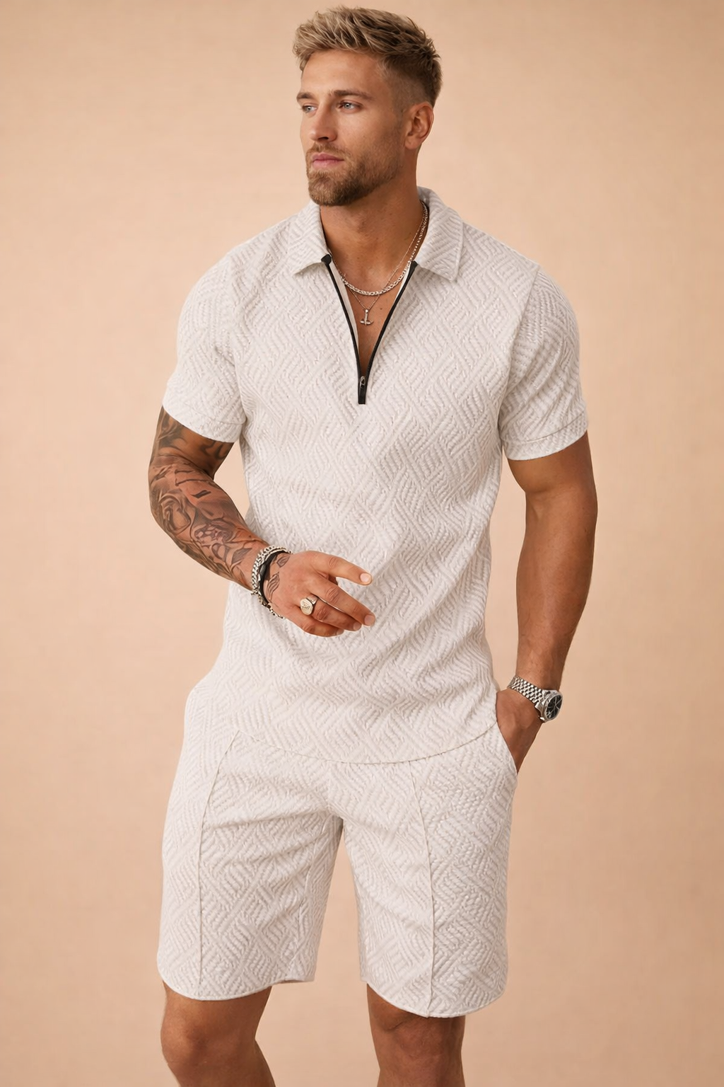 Modern men's textured collared polo shirt & tailored shorts, perfect for warm weather style.