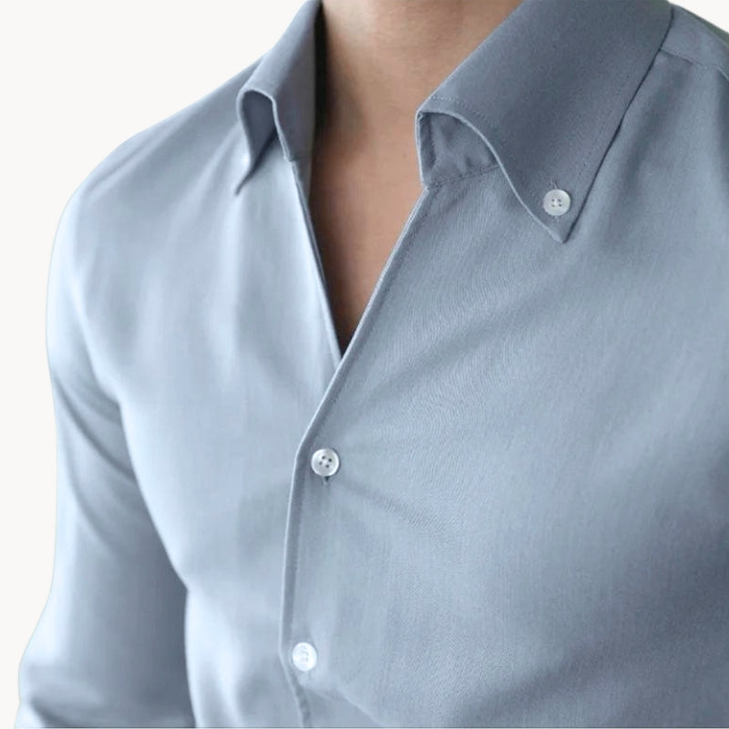 Stylish men's fitted long sleeve shirt, ideal for formal or smart casual outfits. Comfortable & sleek design.