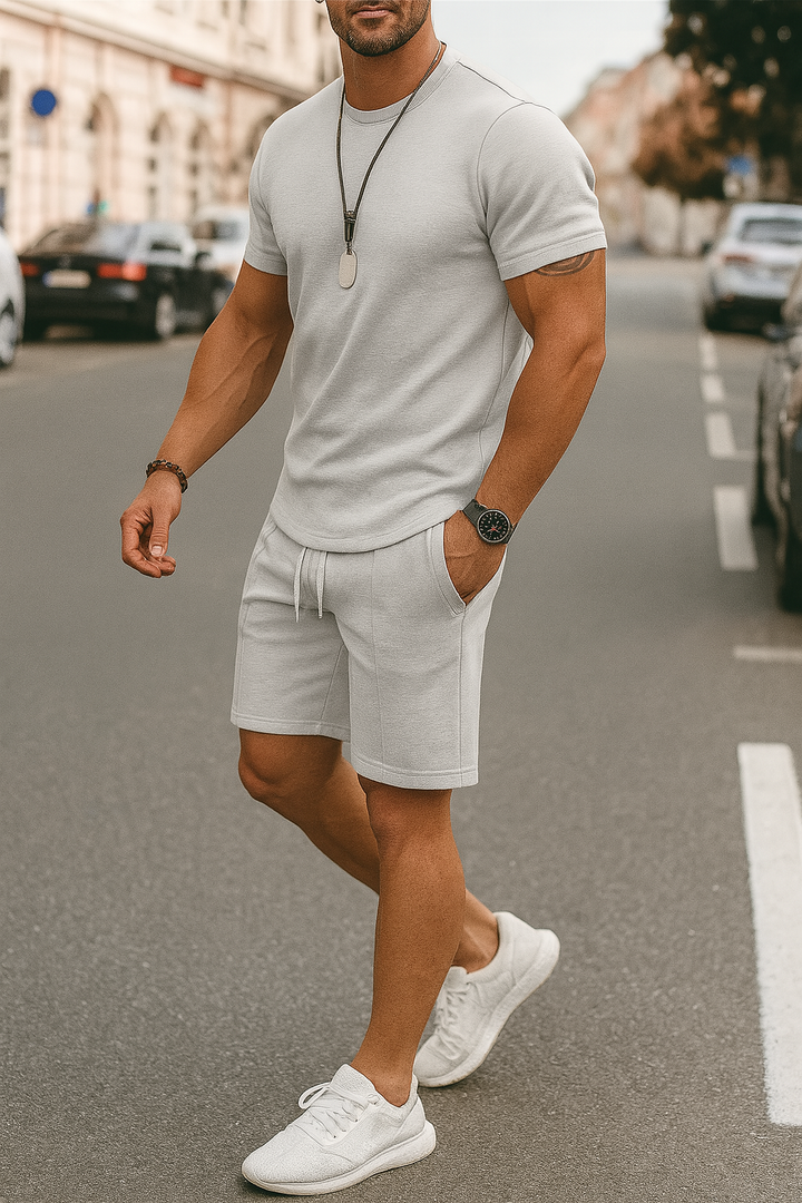 Coordinated men's short set: casual t-shirt & comfy athletic shorts, ideal for summer street style.