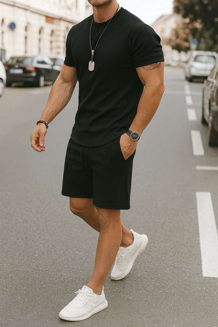 Men's coordinated summer outfit: a casual two-piece short set with a stylish tee for lounge & street.
