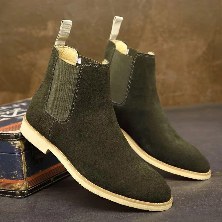 Classic men's minimalist Chelsea ankle boots with easy slip-on, low heel for comfort & versatility.