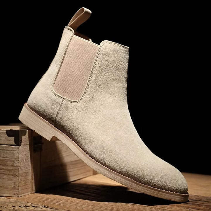 Men's comfortable & versatile Chelsea ankle boots with easy slip-on design, perfect for casual or dress.