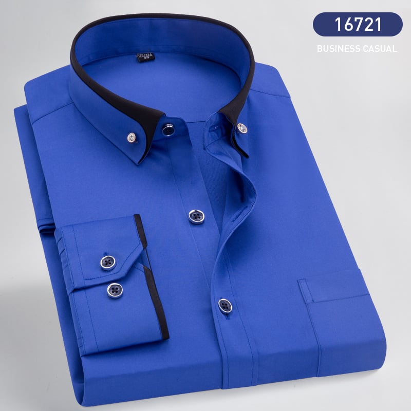 Stylish man in Victor long-sleeve collared shirt. Comfortable & elegant, perfect for both casual and formal men's fashion.