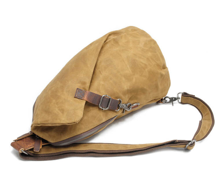 Men's water-resistant canvas anti-theft crossbody bag, functional and stylish for any journey.