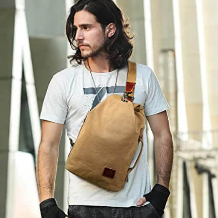 Durable men's canvas anti-theft sling bag, featuring water-resistant design & secure hidden pockets.