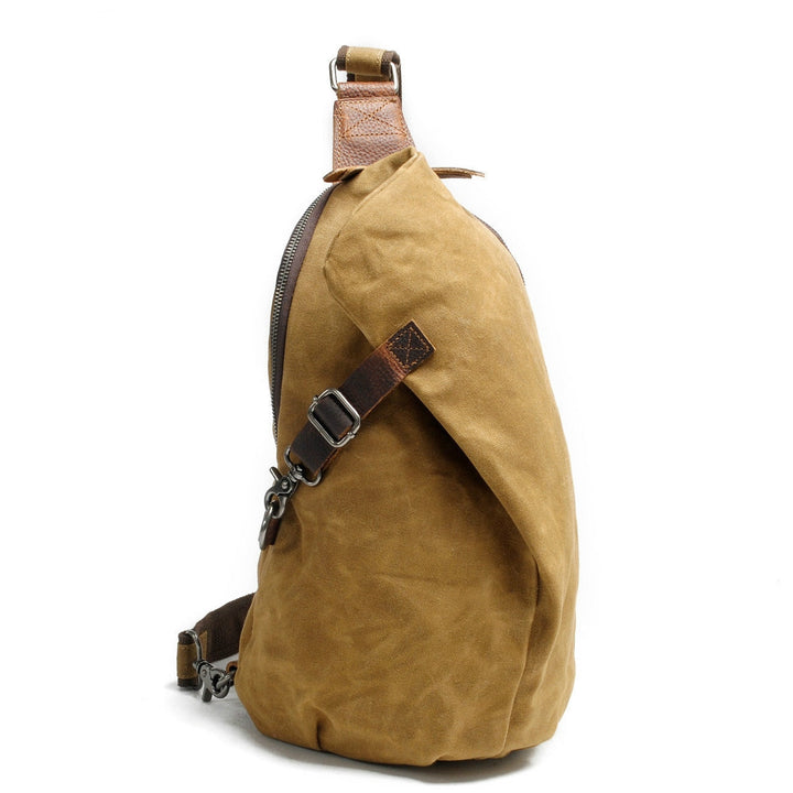 Versatile MultiWear men's canvas sling bag, water-resistant with discreet anti-theft pocket for valuables.