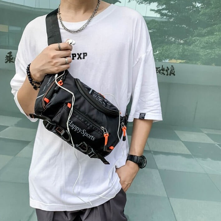 Crossbody view of a men's water-resistant travel and outdoor sling bag, hands-free.