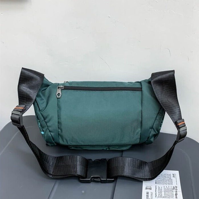 Versatile men's sling & waist pack, designed for active travel and outdoor activities.