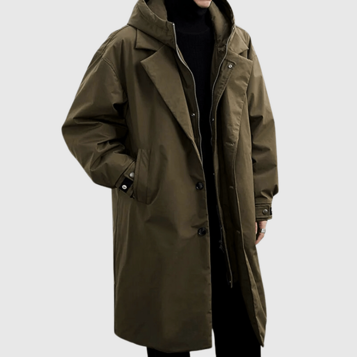 Men's waterproof raincoat, ideal for all-weather protection. Features an adjustable hood, perfect for outdoor gear & travel.