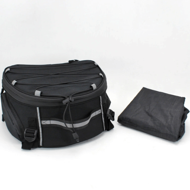 Black water-resistant motorcycle luggage bag, versatile multi-compartment storage for rider gear. Durable adventure accessory.