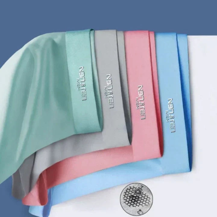"Men's breathable boxers 4-pack, moisture-wicking, soft fabric, elastic waistband, stylish colors, comfortable fit."