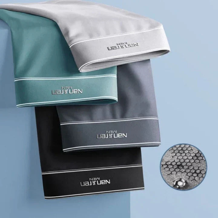"Men's breathable boxers 4-pack, moisture-wicking, soft fabric, elastic waistband, stylish colors, comfortable fit."