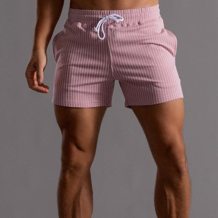 Men's casual striped shorts in green, showcasing the elastic waistband and comfortable fit.