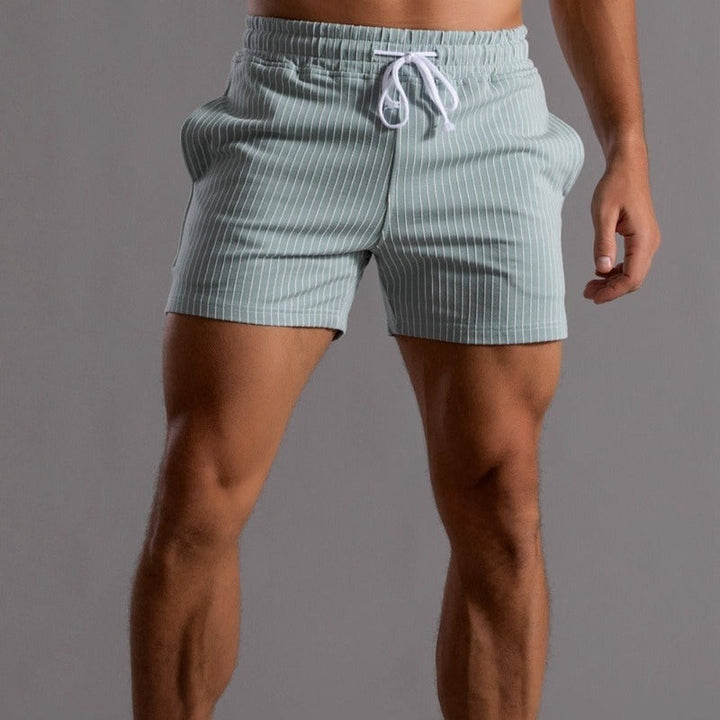 Men's casual striped shorts in black, highlighting the versatile design.