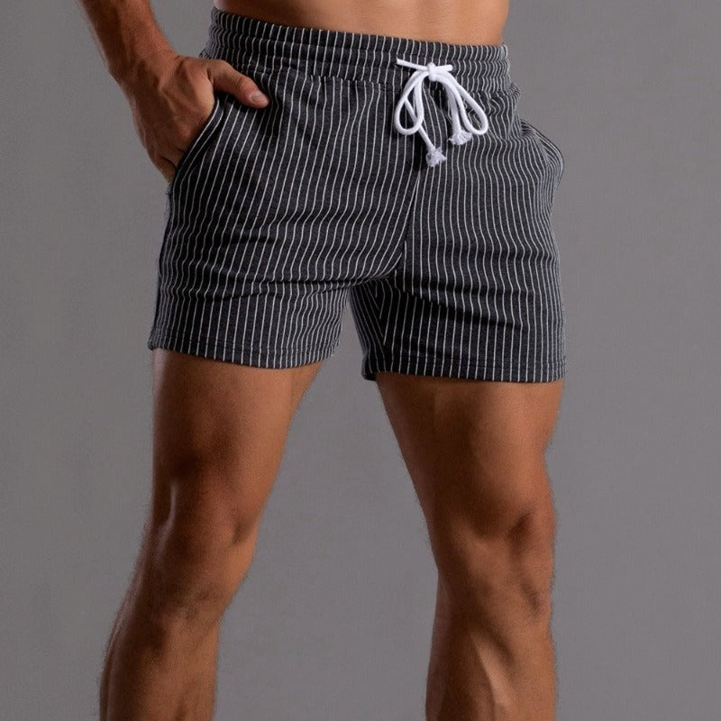 A person wearing men's casual striped shorts, demonstrating a stylish and comfortable look.