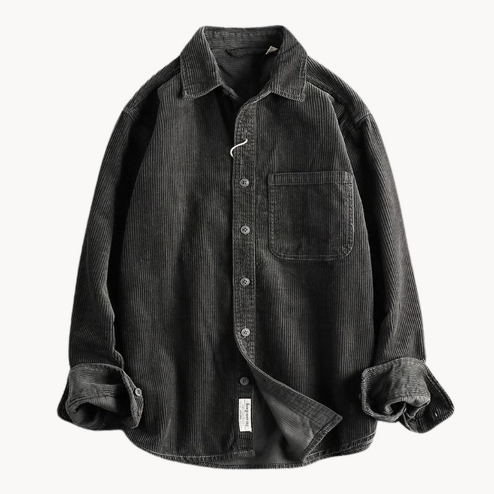 Men's classic orange corduroy shirt with button-down front and textured fabric, ideal for layering and timeless style.