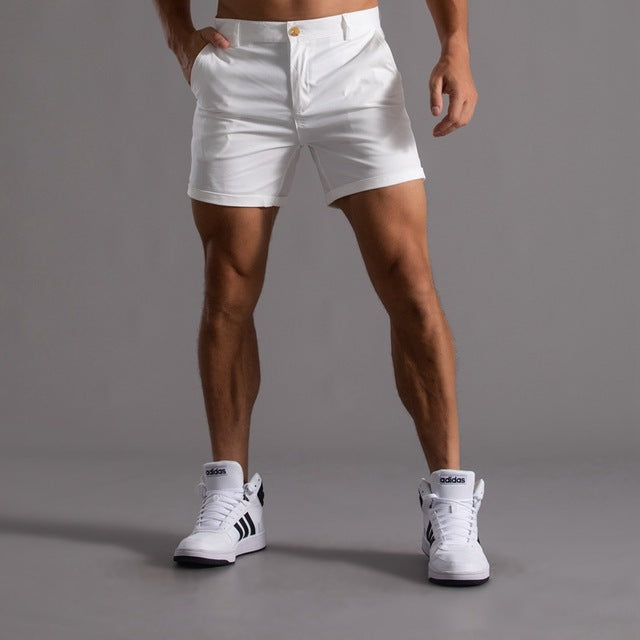 Men's cotton knee-length chino shorts in khaki, featuring a classic summer design and breathable material, ideal for casual w