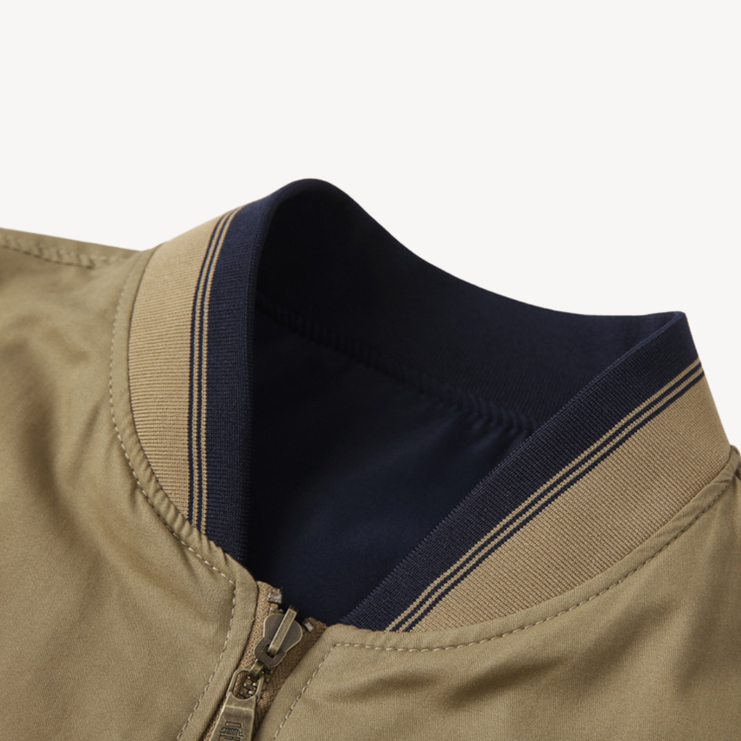 "Men's lightweight reversible bomber jacket, slim fit, available in multiple colors, showcasing ribbed cuffs and zip closure.