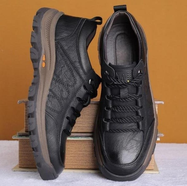 Lifestyle shot of men wearing black orthopedic shoes