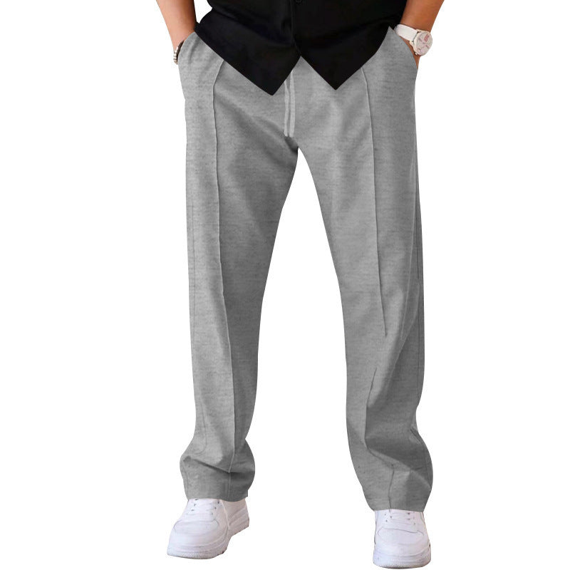 "Men's relaxed linen trousers, wide-leg, breathable, versatile colors like beige, black, blue; perfect comfort and style"