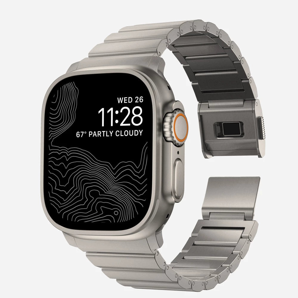 Men's sleek titanium watch band with shiny finish, magnetic clasp, durable and lightweight; perfect for daily or formal wear.