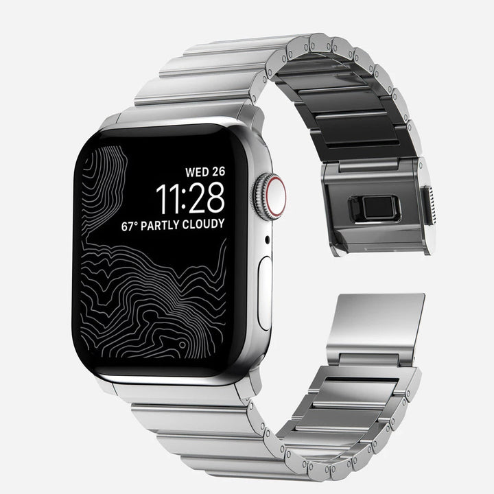 Men's sleek titanium watch band with shiny finish, magnetic clasp, durable and lightweight; perfect for daily or formal wear.