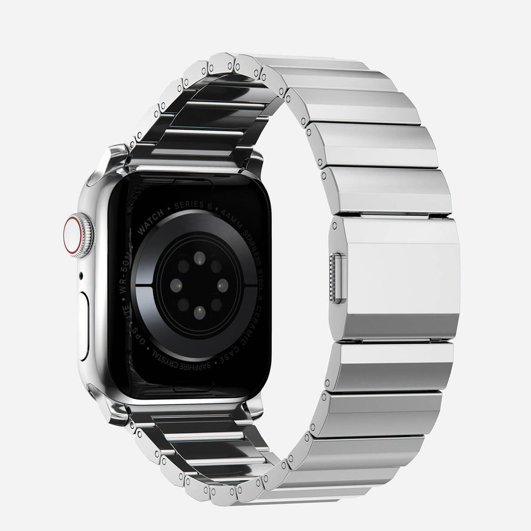 Men's sleek titanium watch band with shiny finish, magnetic clasp, durable and lightweight; perfect for daily or formal wear.