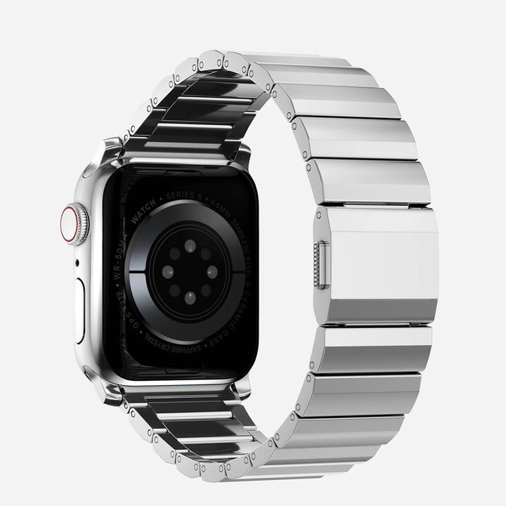 Men's sleek titanium watch band with shiny finish, magnetic clasp, durable and lightweight; perfect for daily or formal wear.
