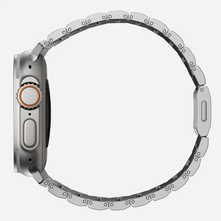 Men's sleek titanium watch band with shiny finish, magnetic clasp, durable and lightweight; perfect for daily or formal wear.