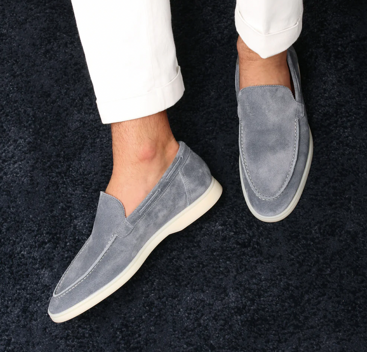 "Men's suede loafers in dark brown, elegant and comfortable, perfect for casual or formal wear, crafted from luxury suede."