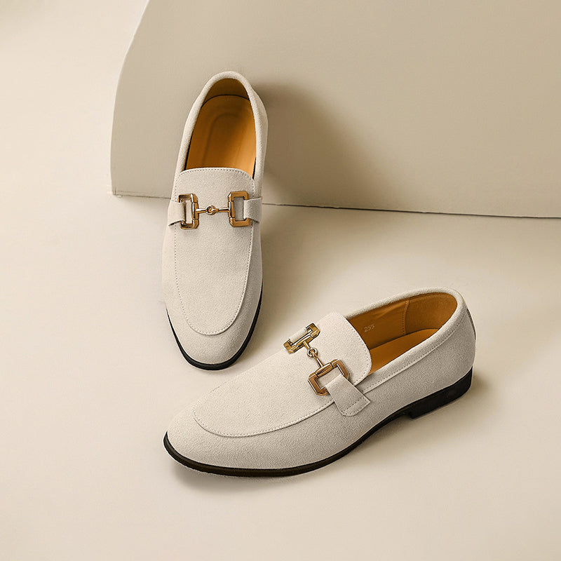Men's suede loafers with horsebit detail, almond toe, crafted for semi-formal occasions, offering elegant versatile style.