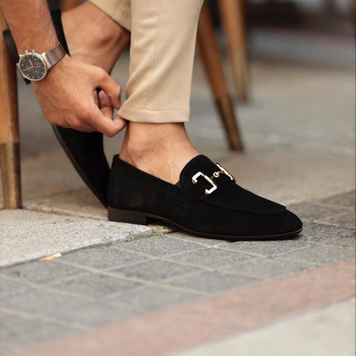 Men's suede loafers with horsebit detail, almond toe, crafted for semi-formal occasions, offering elegant versatile style.