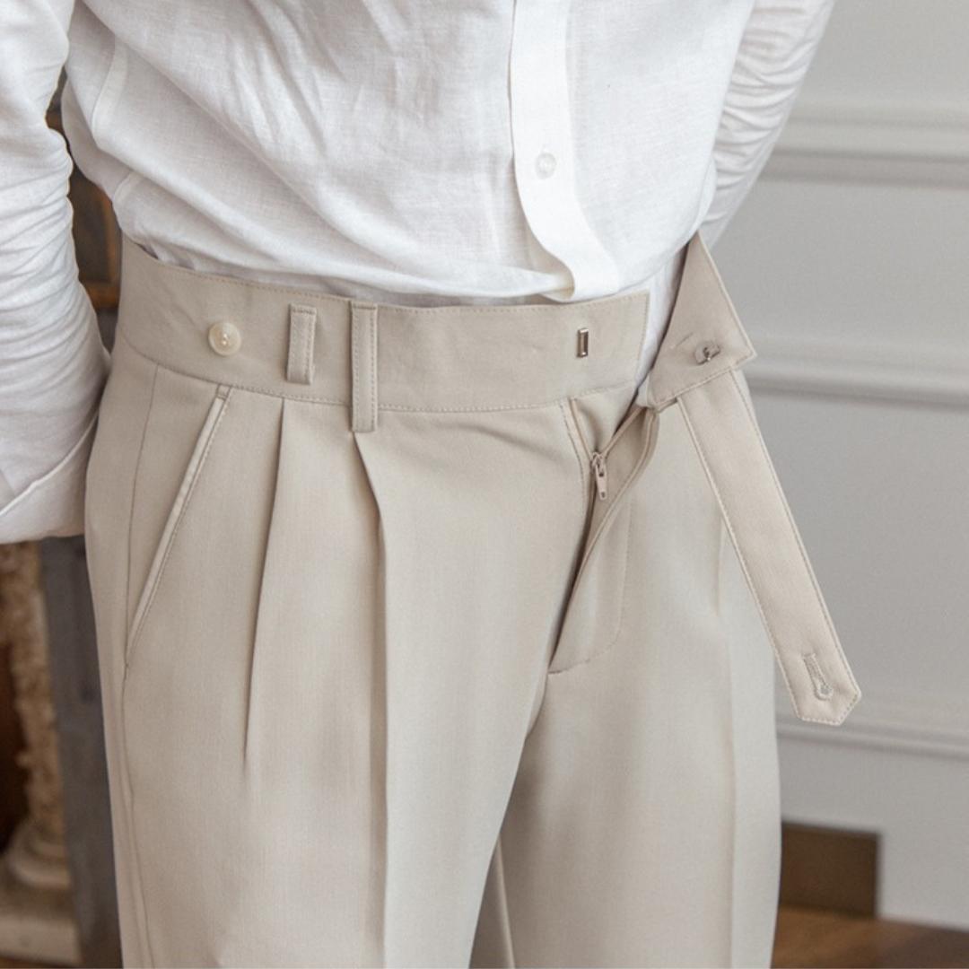 Men’s tailored essential trousers in classic colors, streamlined fit, perfect for formal or casual wear, showcasing elegance.
