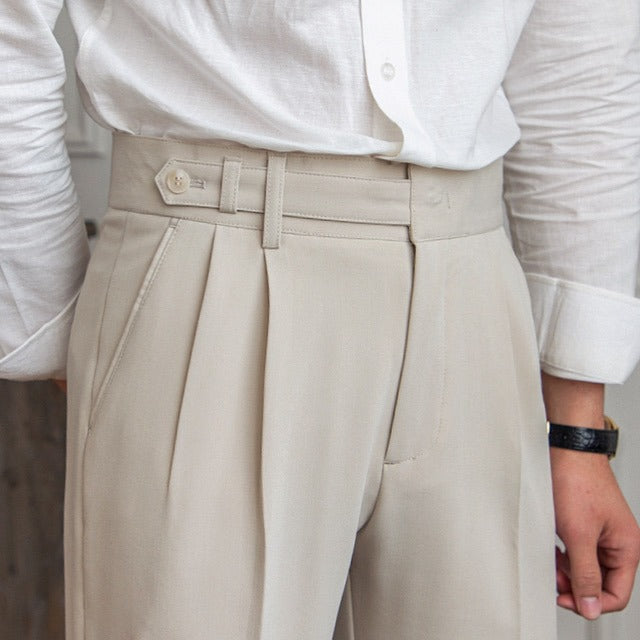 Men’s tailored essential trousers in classic colors, streamlined fit, perfect for formal or casual wear, showcasing elegance.