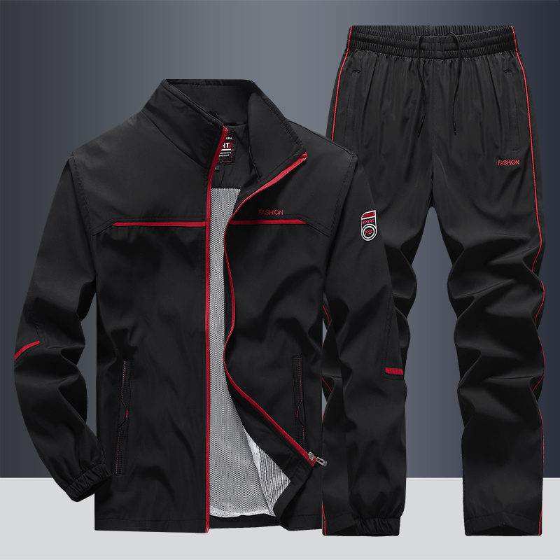 "Men's two-piece striped tracksuit with zip jacket and drawstring joggers, bold stripe design, comfortable fabric."