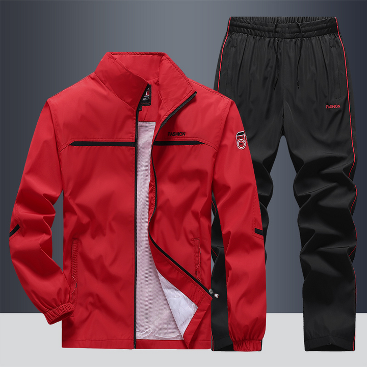 "Men's two-piece striped tracksuit with zip jacket and drawstring joggers, bold stripe design, comfortable fabric."