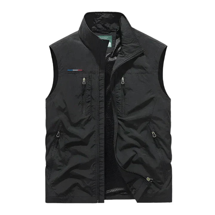 Men's waterproof insulated bodywarmer, sleek with multiple zip pockets; ideal for outdoor adventures in rain or chilly weathe