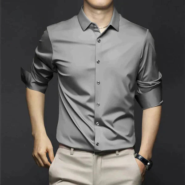 "Men's wrinkle-free dress shirt in beige. Stylish, tailored fit perfect for formal and casual settings."