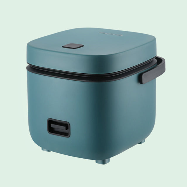 "Mini rice cooker and steamer, compact design for 1-2 people, 1.2L capacity, in green, ideal for small kitchens or travel."