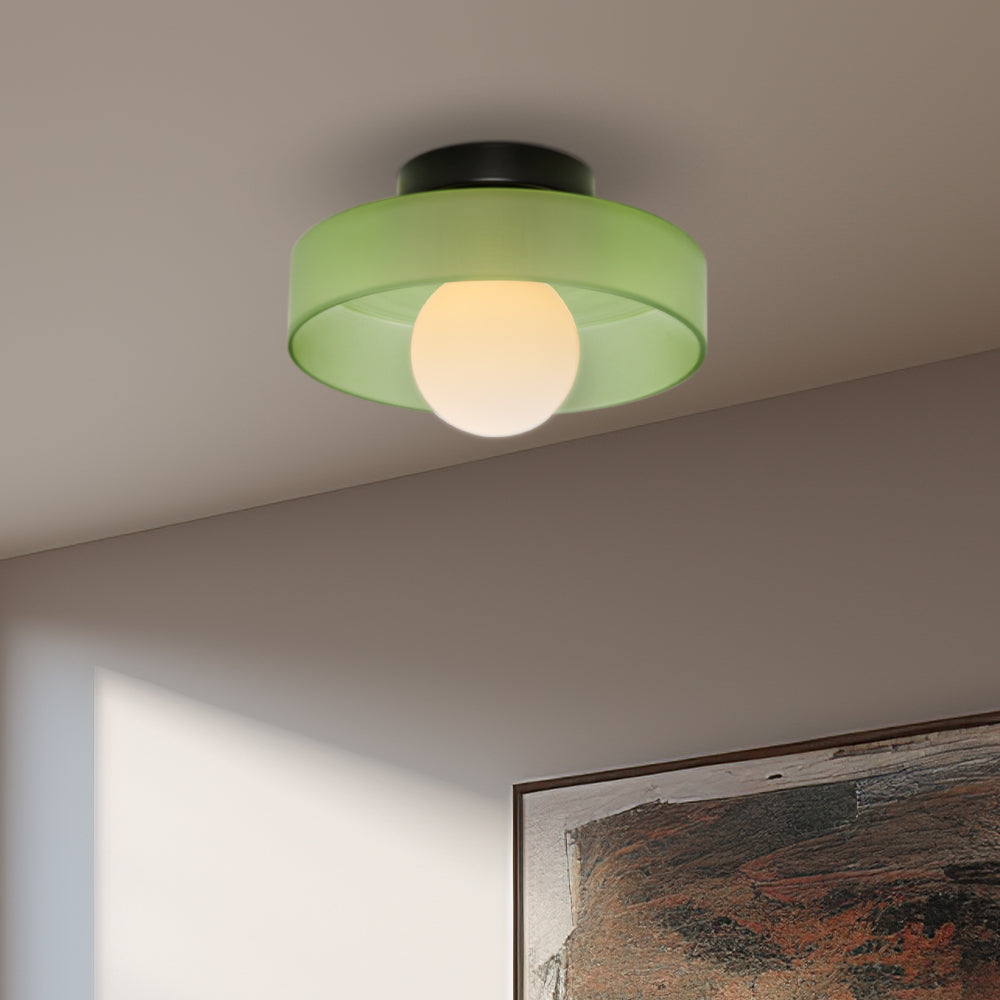 "Minimal flush mount ceiling light with frosted shade, sleek finish, offers soft illumination; ideal for modern and tradition