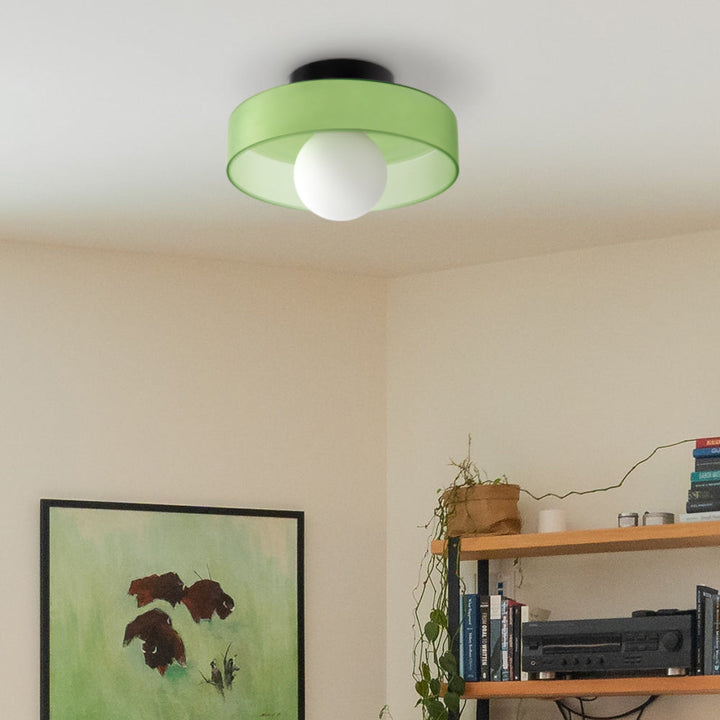 "Minimal flush mount ceiling light with frosted shade, sleek finish, offers soft illumination; ideal for modern and tradition
