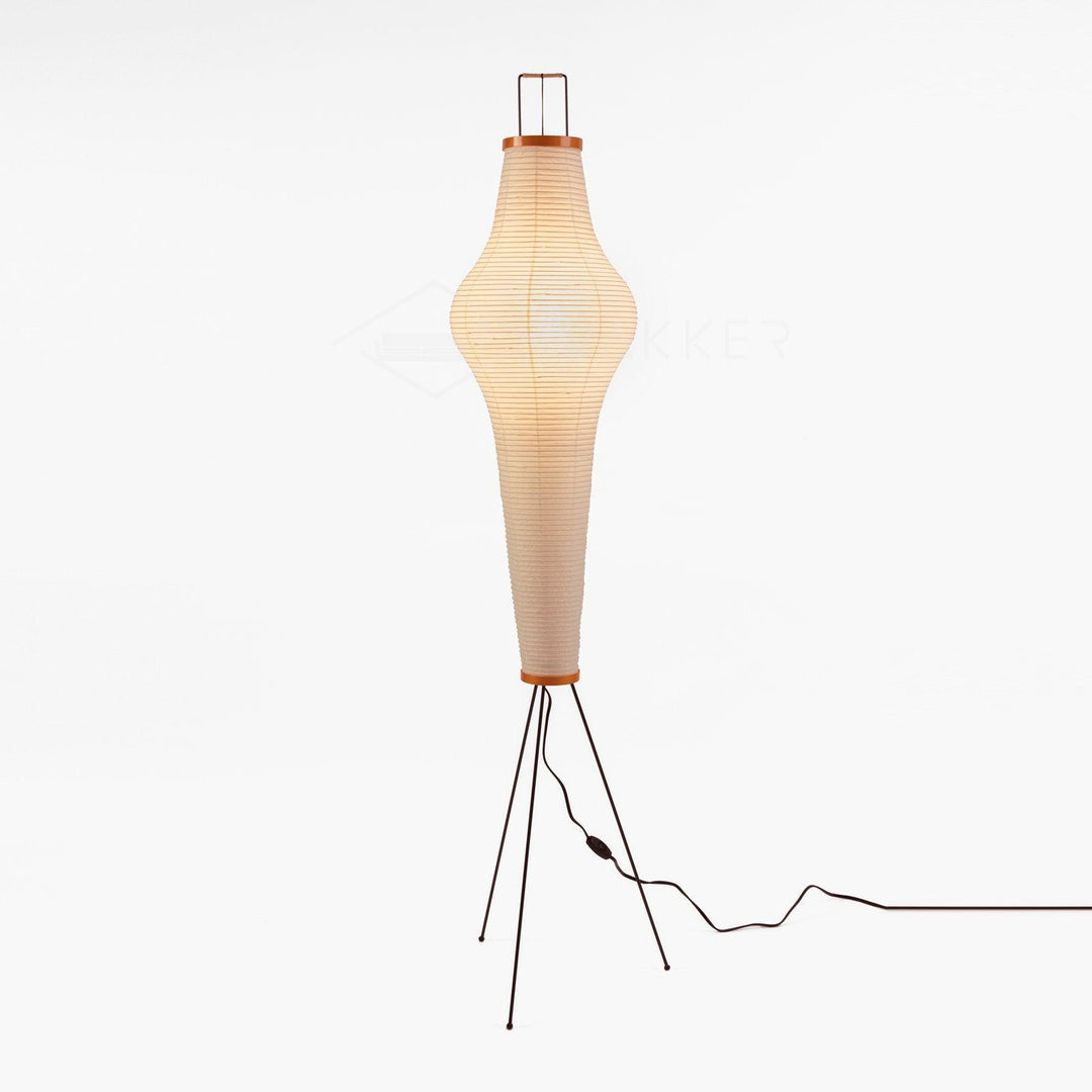 "Minimalist rice paper floor lamp with sleek metal frame and soft diffused light, perfect for creating a warm ambiance."