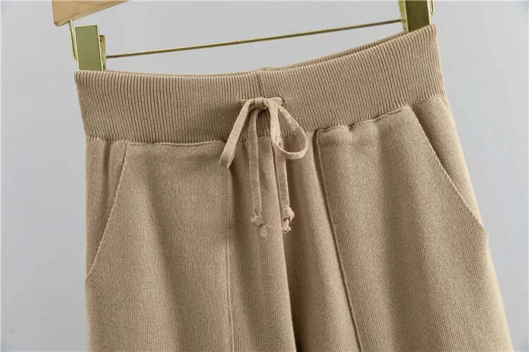 Women's essential ribbed knit homewear set, combining a modern V-neck top with relaxed harem pants.