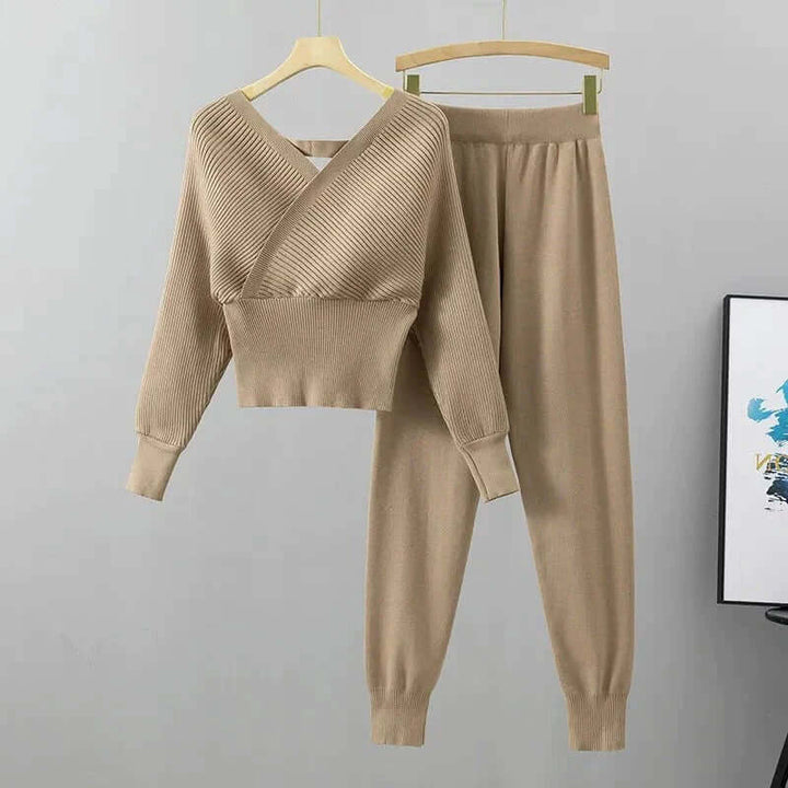 Women's sleepwear: a comfy ribbed knit V-neck top and matching harem pants in beige.