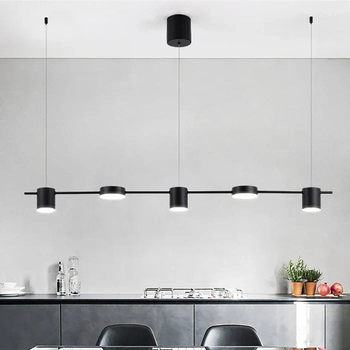 Gold finish AuraDrum modern drum pendant light, ideal for elegant kitchen lighting.