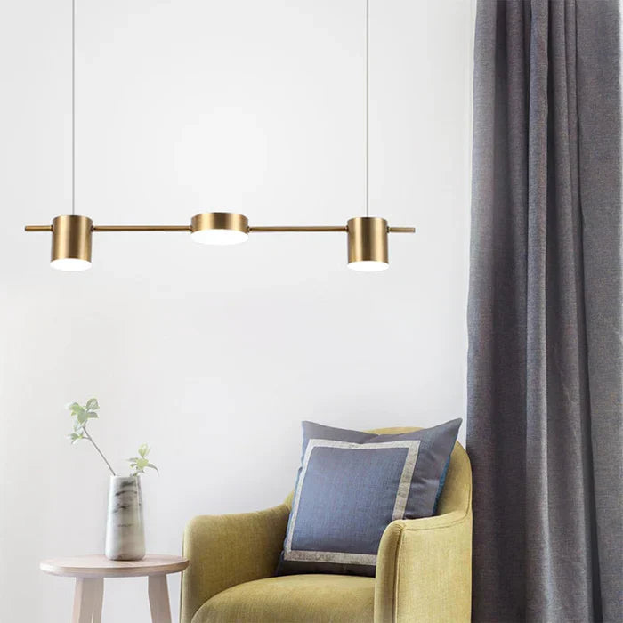 Sleek AuraDrum modern pendant light, a drum ceiling lamp enhancing living room decor.