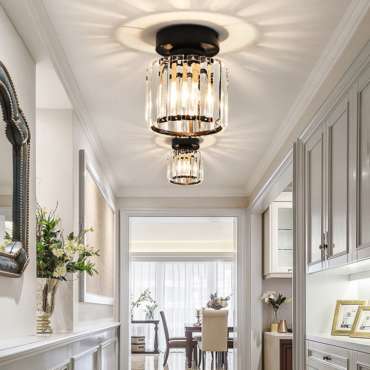 Modern black crystal flush mount ceiling light, sleek brass fixture, crystal shade, ideal for rooms with low ceilings.
