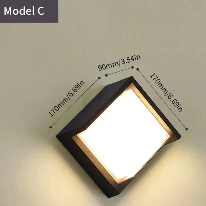 Modern black LED outdoor wall light with motion sensor, waterproof ABS, enhances security, suits balconies, porches, gardens.