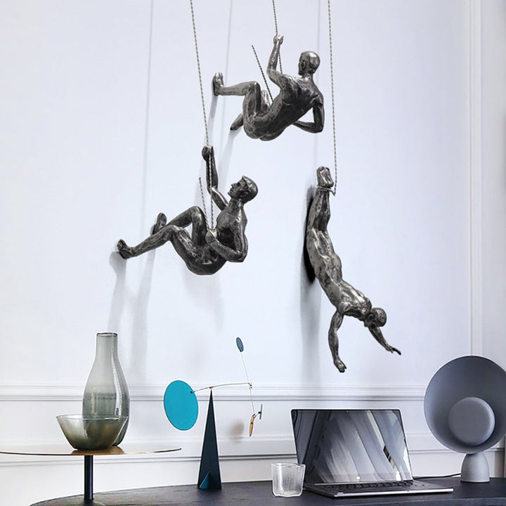 Dynamic climber wall sculpture, inspiring modern home decor. Perfect abstract art for ambition.